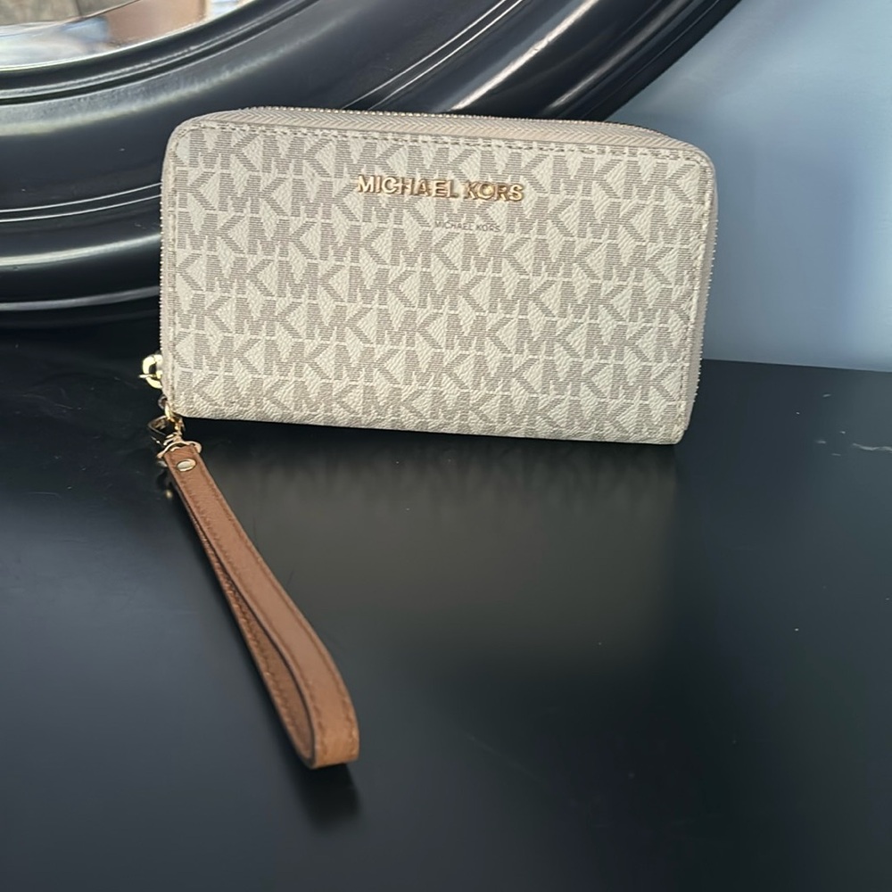 Nice wallet. Only used a couple times but there is a small pen marking.
